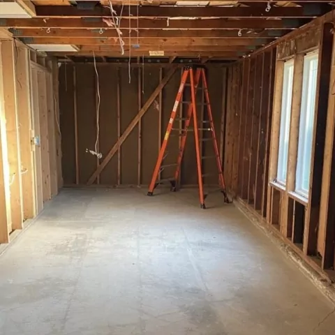The same room after the cleanout, with a clear floor