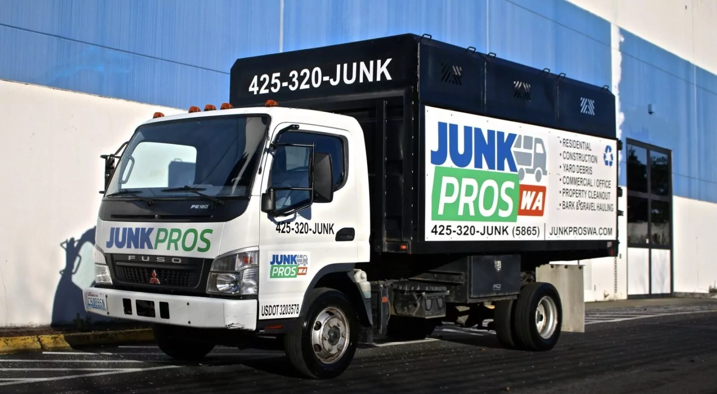 Junk Pros junk removal truck with a high-sided cargo box